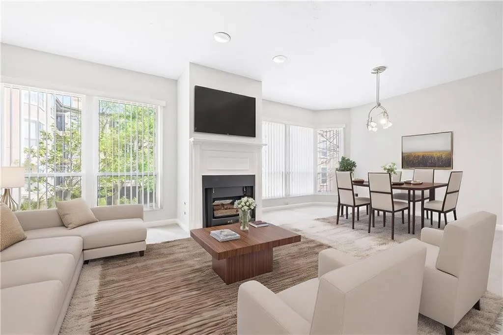 Virtually Staged to show living room with dining table