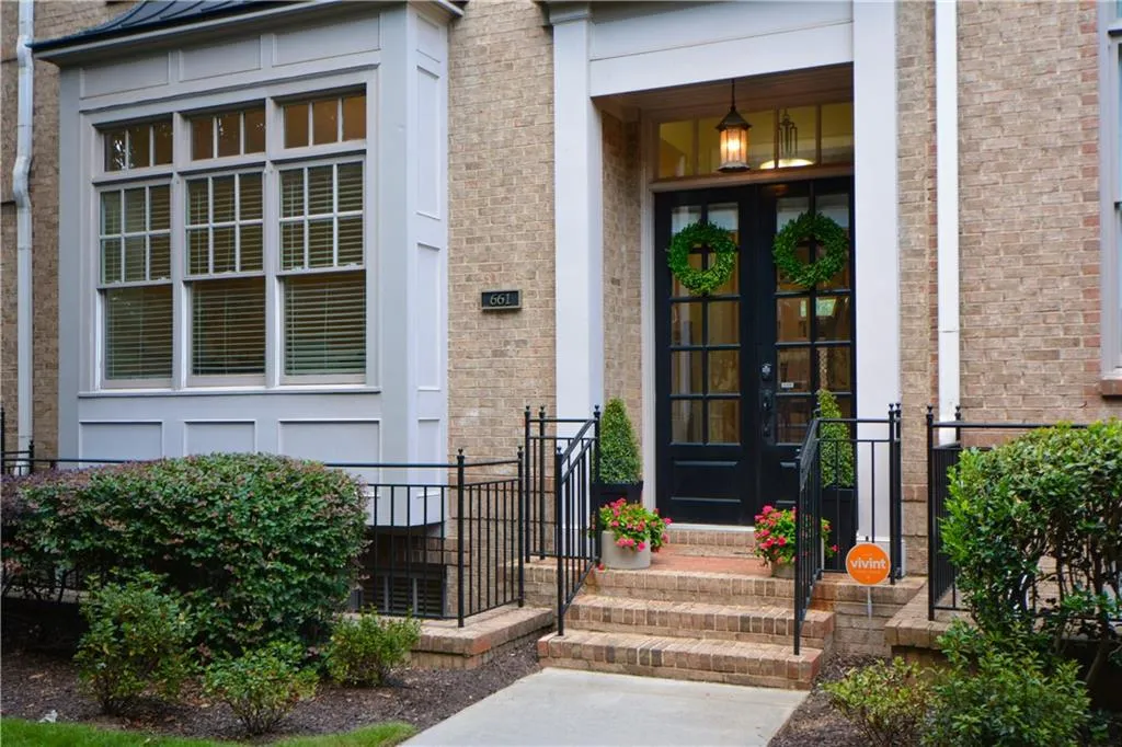 Entrance to property with french doors and brick siding