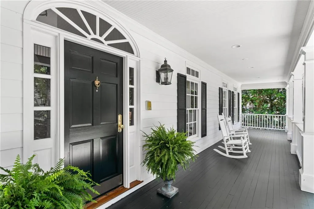Welcoming wrap around front porch.