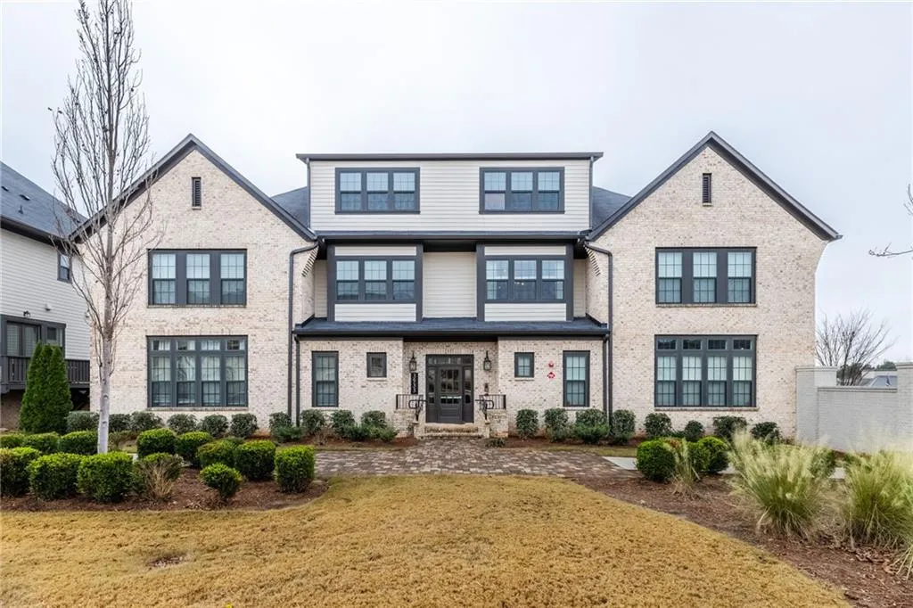 View of front of house with brick siding